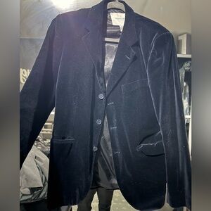 It’s an all black velvet blazer